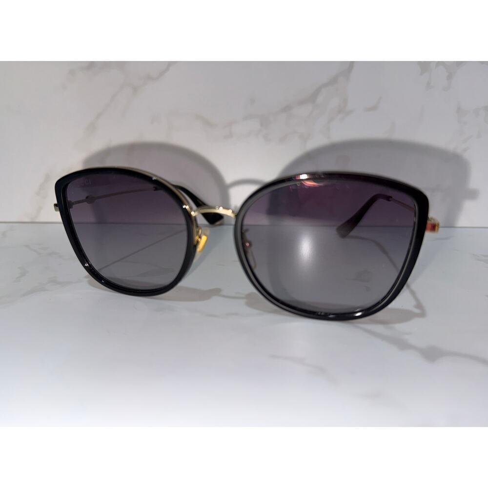 Gucci Cat-Eye Sunglasses in Black with Gold Trim - Vintage